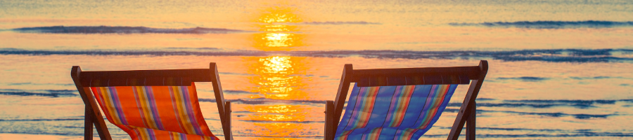 Deck chairs with sunset